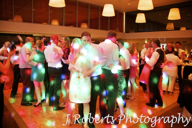 Packed dance floor at wedding reception at the Kirribilli Club  - wedding photography sydney